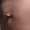 Kachikau child belly